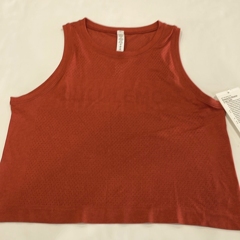 Brand new Lululemon.  breeze muscle top. Crop tank.